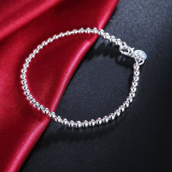 Bracelet à breloques en argent regardé 925 pour femme