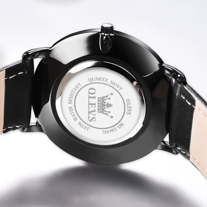 Nouvelle montre OLEVS Quartz pour hommes ultra-mince 6.5mm minimaliste résistante à l'eau avec affichage de date pour occasions professionnelles et décontractées