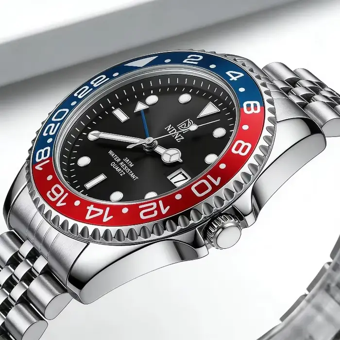 Montre à quartz NDNZ GMT avec lunette rotative 24H, bracelet en acier inoxydable, résistante à l'eau pour homme occasions spéciales