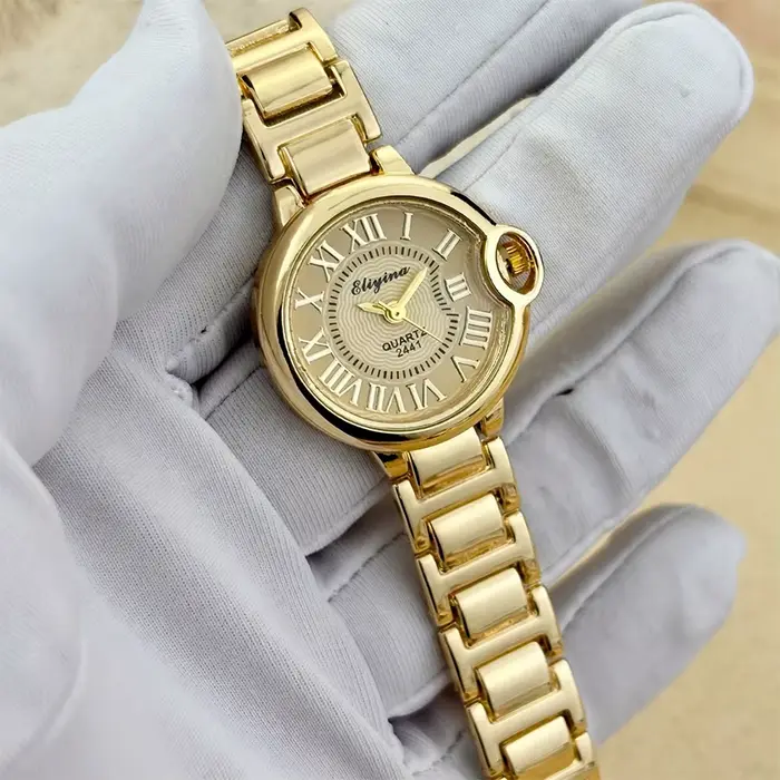 Montre-bracelet classique vintage en or pour femmes