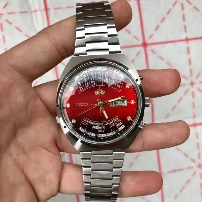 Montre automatique mécanique unisexe Orient 118A avec grand cadran rotatif