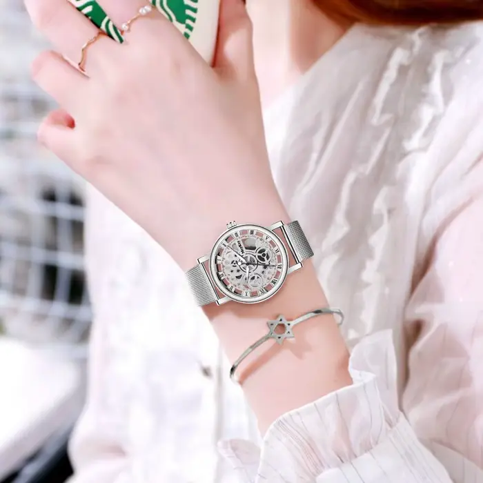Montre mécanique à cadran creux pour femmes