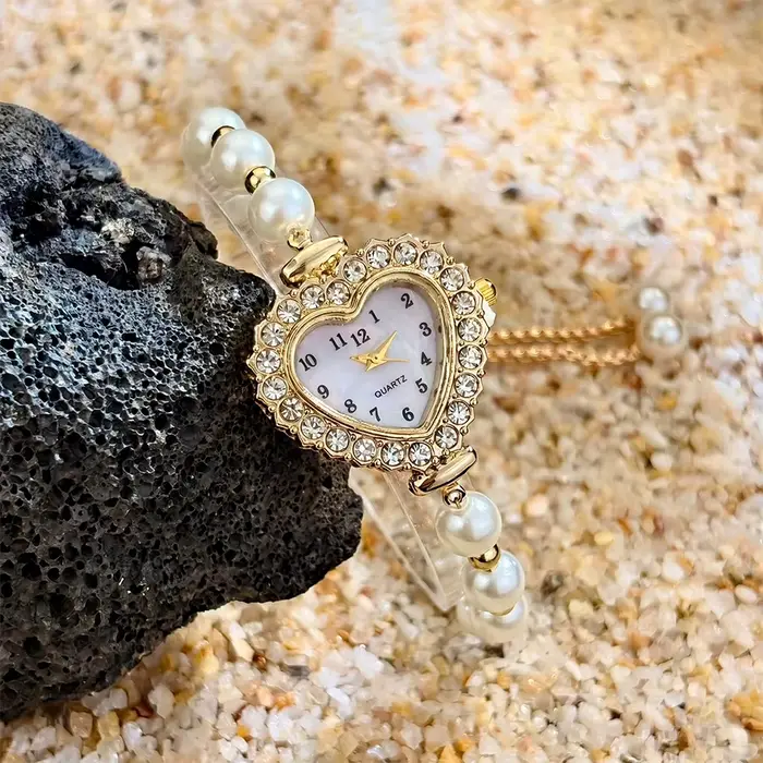 Montre élégante pour femme avec cadran en forme de cœur et bracelet en perles à cordon