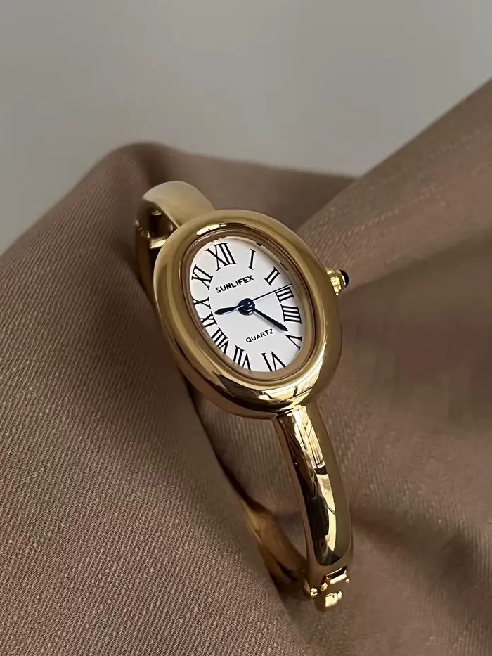 Montre-bracelet ovale en or pour baignoire