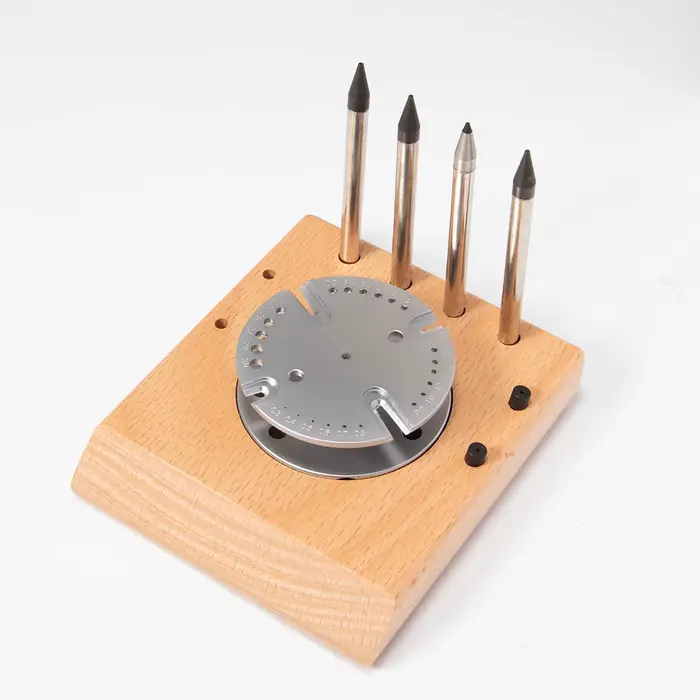 Outil de réparation de montres pour le retrait et l'installation de l'arbre de balancier de montre, 