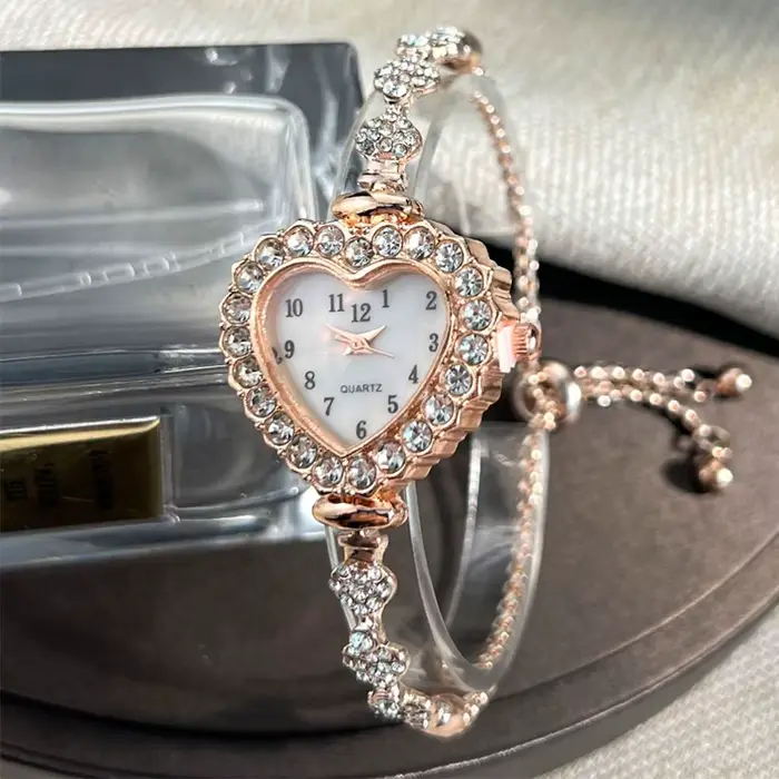 Nouvelles montres à Quartz en acier inoxydable montre en forme de coeur avec Bracelet réglable femmes montre-Bracelet décoration de poignet exquise