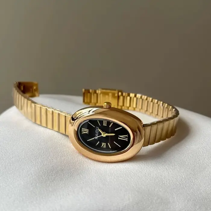 Montres ovales pour femmes avec bracelet en acier inoxydable