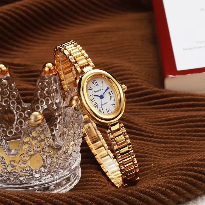 Montre femelle ceinture en acier haute beauté ovale baignoire quartz simple grosses montres bracelet occasions spéciales