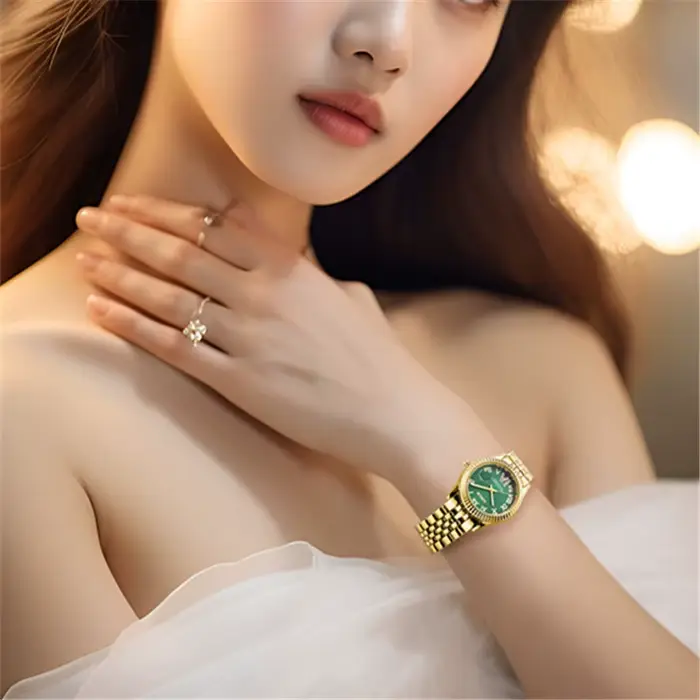 Montre XINEW à Quartz dorée avec calendrier complet pour femmes occasions spéciales