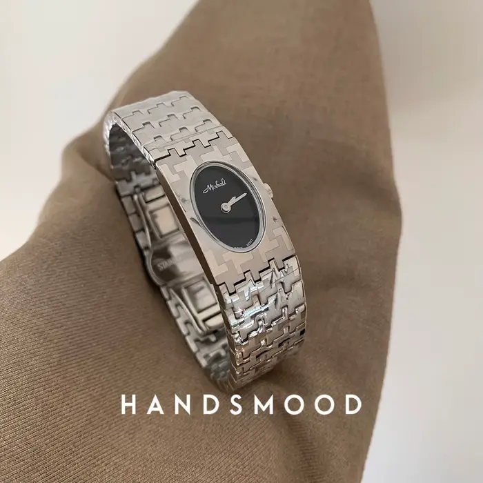 Montre en argent avec bracelet en acier inoxydable pour femme