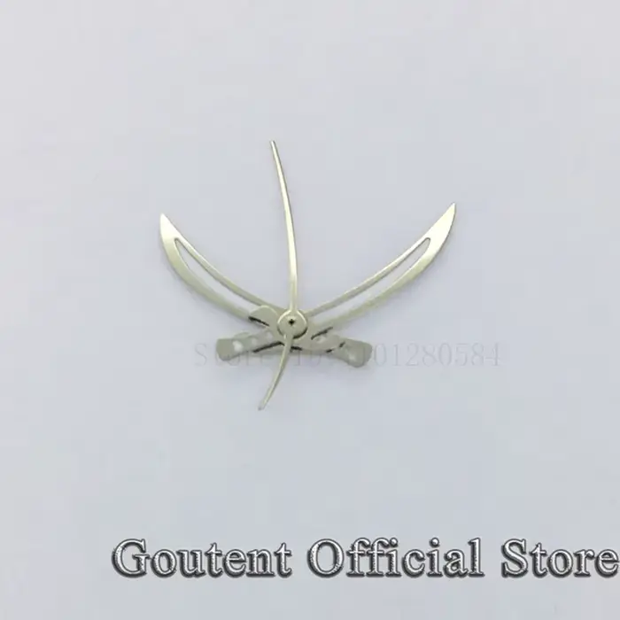 Goutent – aiguilles de montre dorées et argentées