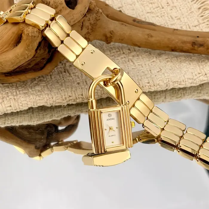 ‌ Montre en or - Montre tendance pour femme avec cadran en forme de cadenas créatif