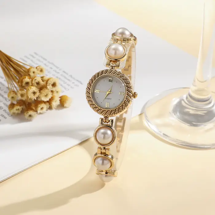 Nouvelle Montre Bracelet Élégante en Perles pour Femme