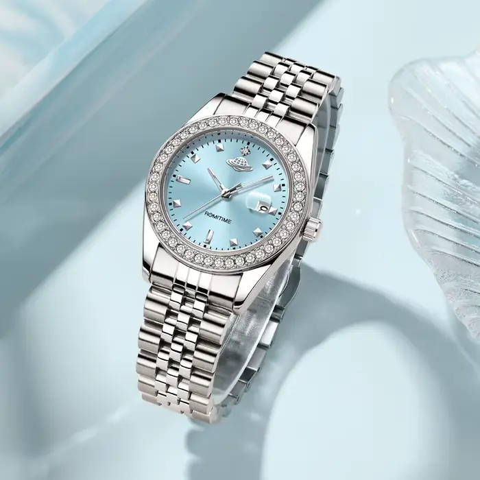 Montre à Quartz Luxe Femmes Planète Collection Calendrier Lumineux Bracelet Acier Occasions Spéciales Robuste et Élégante