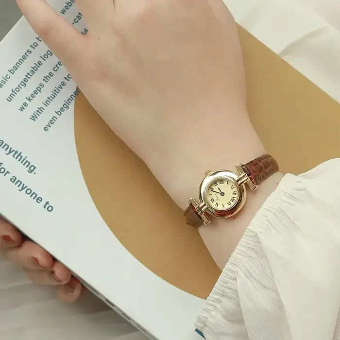 Femmes montre à Quartz de luxe Orologio boîtier en or Reloj chiffres romains