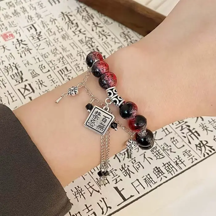 Bracelet perlé rouge de style chinois pour femme