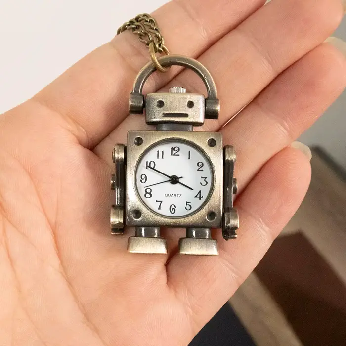 Montre de poche robot à quartz à la mode et cool avec cadran circulaire à chiffres arabes comme souvenir pour les étudiants masculins et féminins