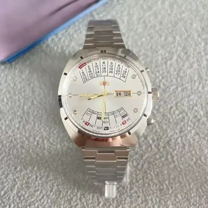 Montre automatique mécanique unisexe Orient 118A avec grand cadran rotatif