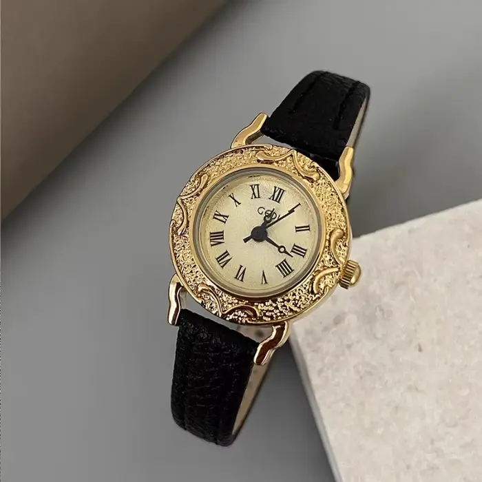 Montre pour femme Vintage lunette gravée en or chiffres romains montre à Quartz montre-bracelet élég