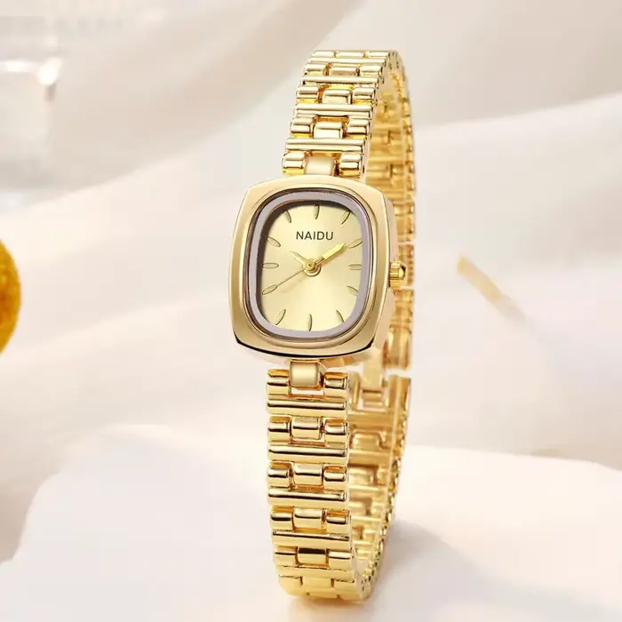 Montre en or avec bracelet en acier inoxydable pour femme