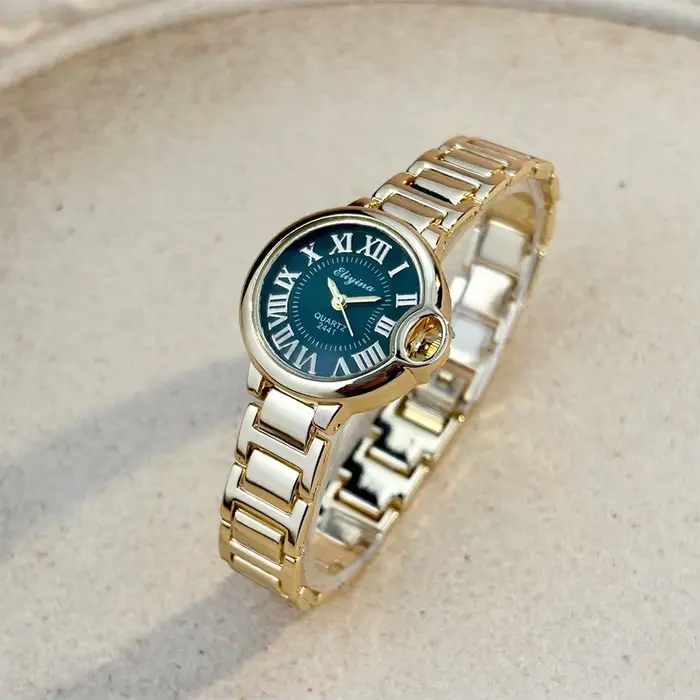 Montre-bracelet élégante pour femmes avec bracelet en acier allié et affichage en chiffres romains pour les occasions spéciales et quotidiennes