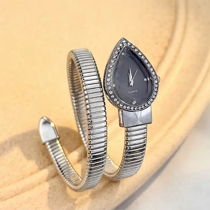 Montre élégante pour femmes avec cadran en forme de goutte d'eau et bracelet en forme de serpent