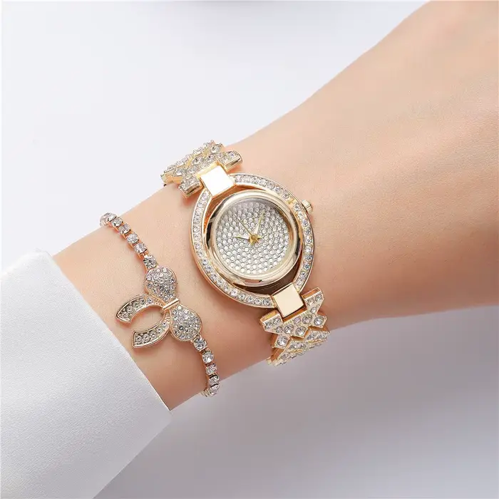 Marques de luxe - Montres à quartz pour femmes - Design créatif avec incrustation de diamants - Montre pour dames en alliage d'or et bracelet en acier inoxydable