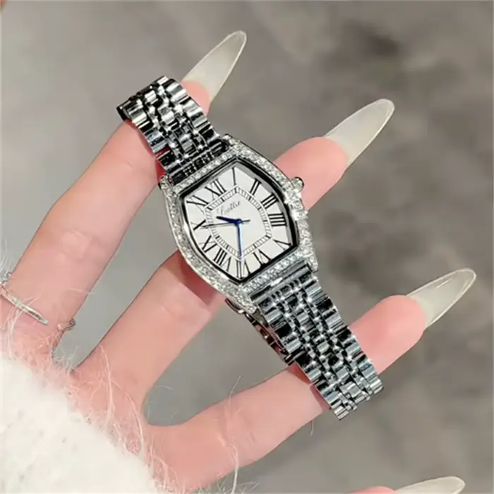 Montre haut de gamme pour femmes, luxueuse et exquise, design artistique, en acier inoxydable, cadea