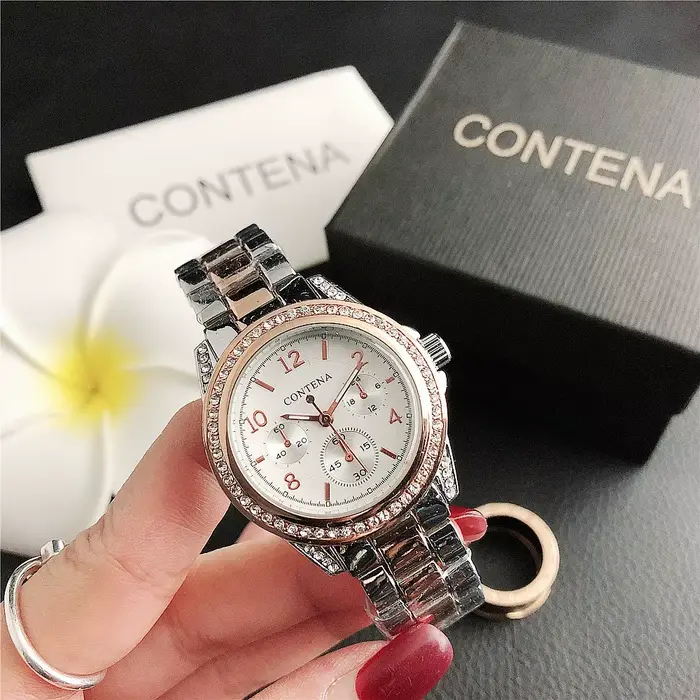 Montre JBAILI pour Femme en Acier Inoxydable avec Strass Tendance Style Fashion et Casual Occasions Spéciales
