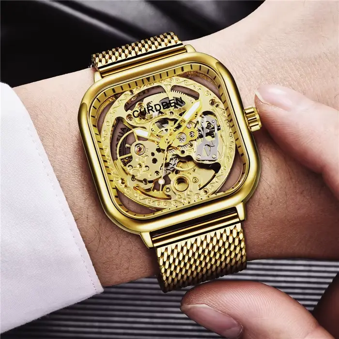 CURDDEN marque montres pour hommes mode bracelet en acier inoxydable doré évider automatique montre mécanique Relogio Masculino Ouro