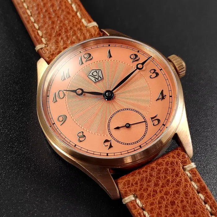 Montre mécanique manuelle Cronos avec boîtier en étain bronze guilloché pour hommes élégance quotidienne et occasions spéciales