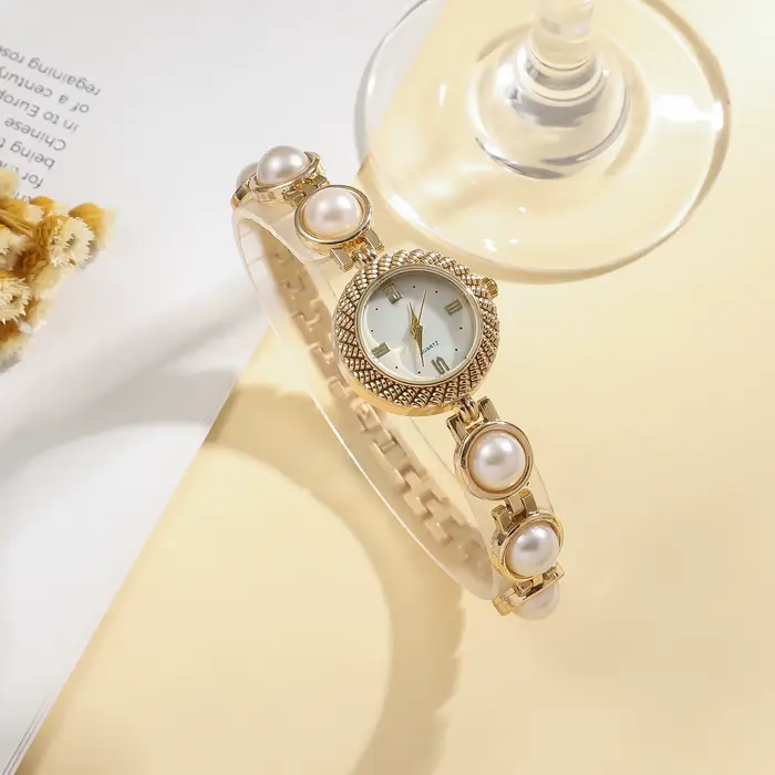 Nouvelle Montre Bracelet Élégante en Perles pour Femme