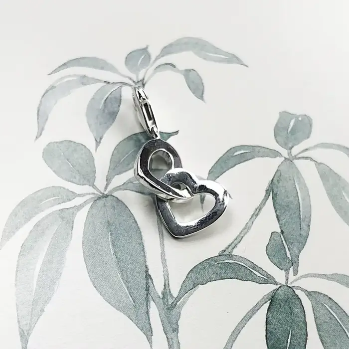 Pendentif deux cœurs entrelacés