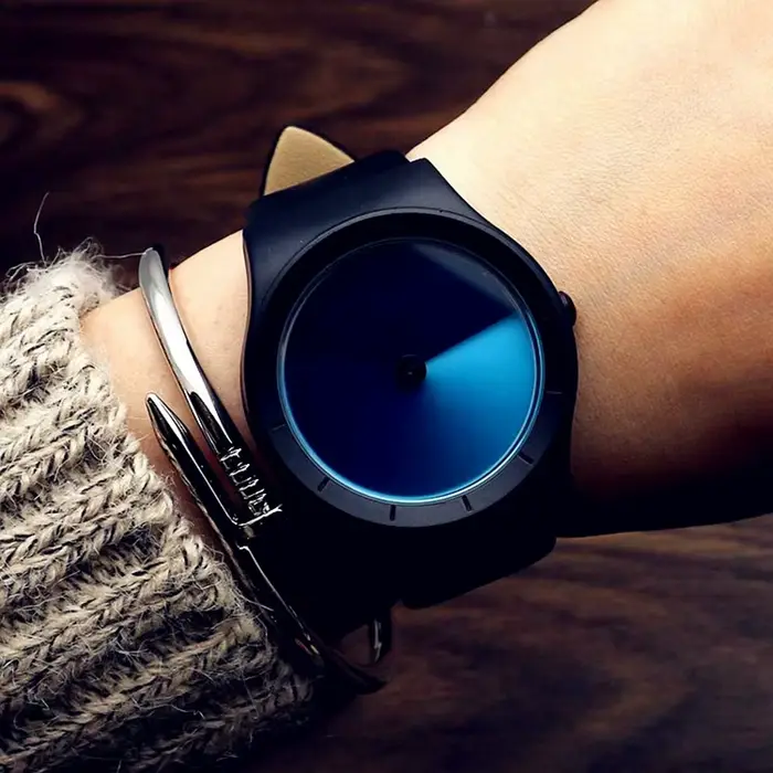 Montre à quartz en cuir véritable pour hommes et femmes