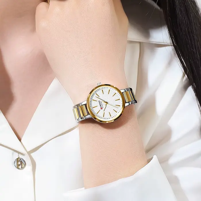 CURREN marque Simple mode dames montre avec cadran ondulé d'eau