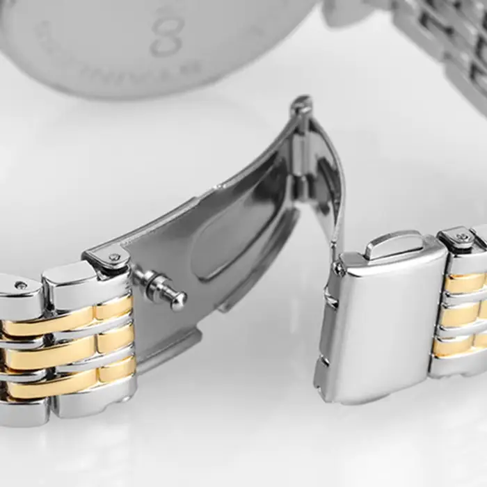 Montre en acier inoxydable avec cadran rond et affichage chiffre romain pour femmes occasions spéciales élégantes