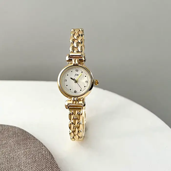 Montre pour femme rétro Bracelet montres petit et exquis polyvalent ceinture en acier dames mode Quartz horloge