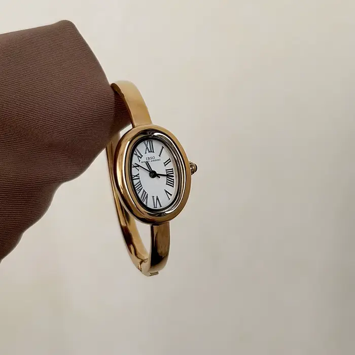 Montre élégante pour femme avec bracelet en alliage, mouvement quartz, cadran ovale, pour occasions spéciales et tous les jours