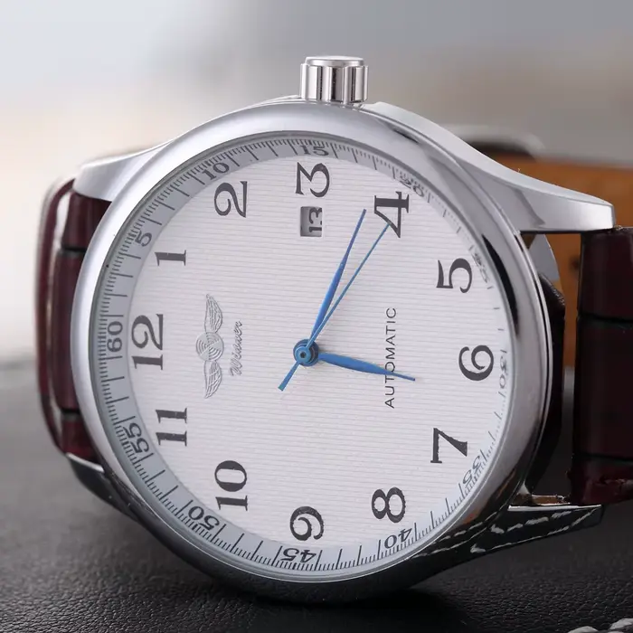 Montre automatique homme T-Winner classique avec bracelet en cuir squelette auto-vent pour occasions formelles et décontractées