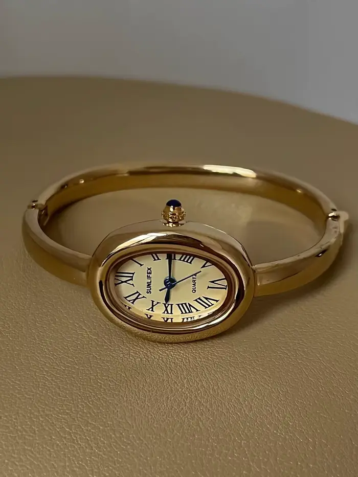 Montre-bracelet ovale en or pour baignoire