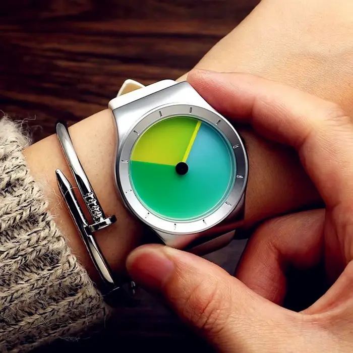 Montre à quartz en cuir véritable pour hommes et femmes