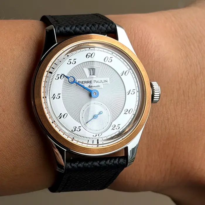 Montre Merkur en acier inoxydable avec anneau en bronze vintage cadran saumon pour hommes occasions spéciales