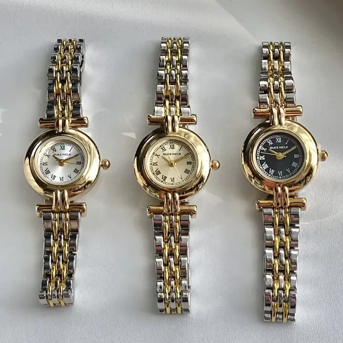 Montre KCALOE Cadran Romain Bracelet Acier Inoxydable Femmes Occasions Spéciales Quartz Bronze Café Rose Multicolore