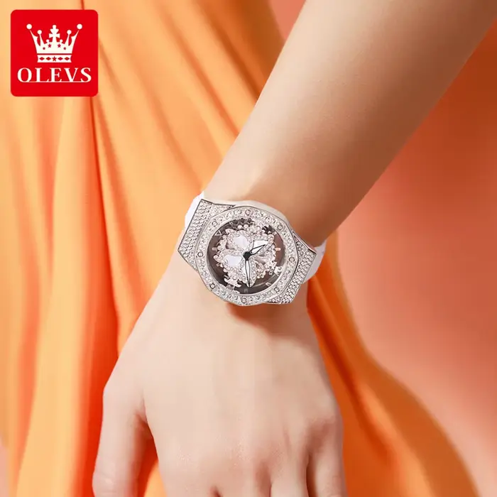 Montre élégante et luxueuse OLEVS 9996 avec design squelette et cadran lumineux pour femmes occasions spéciales