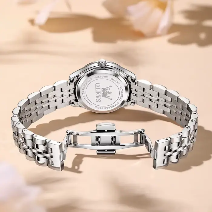 Montres à cadran violet diamant pour femmes